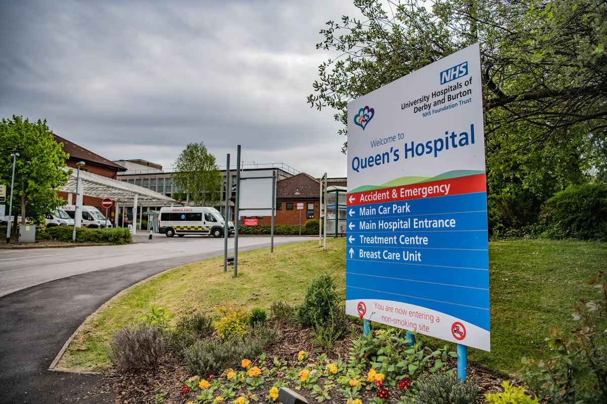 Queen's Hospital Burton welcome sign with Accident and Emergency direction board, Belvedere Road
